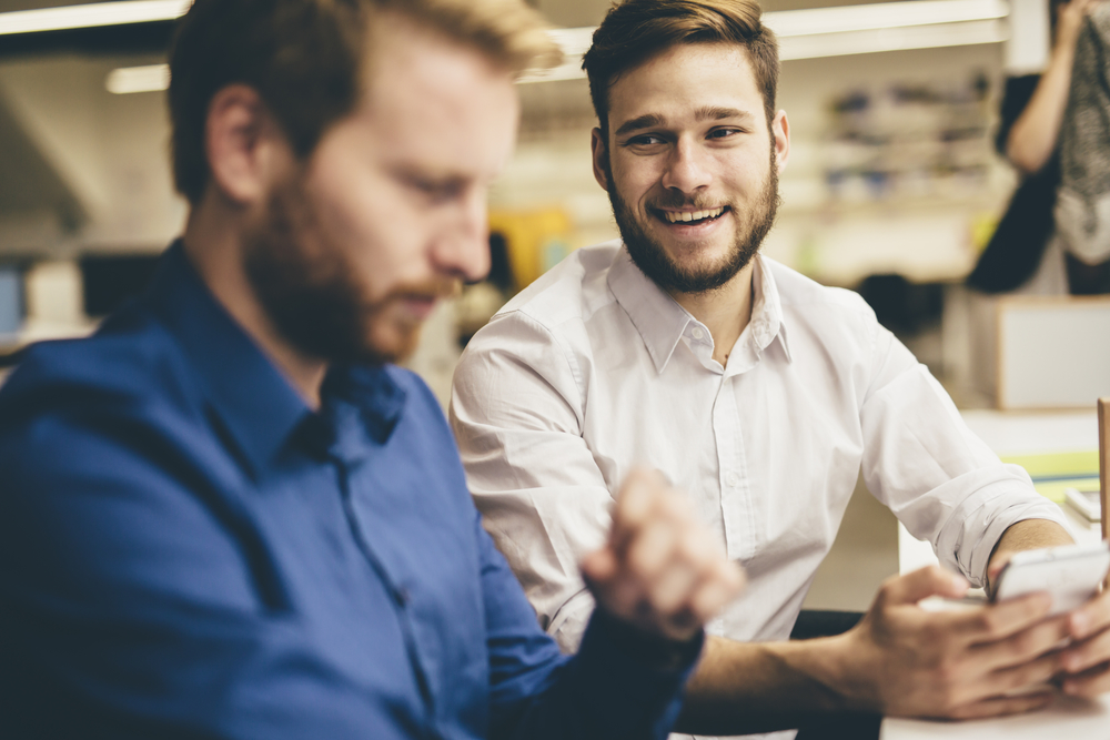 Handsome men working in an office