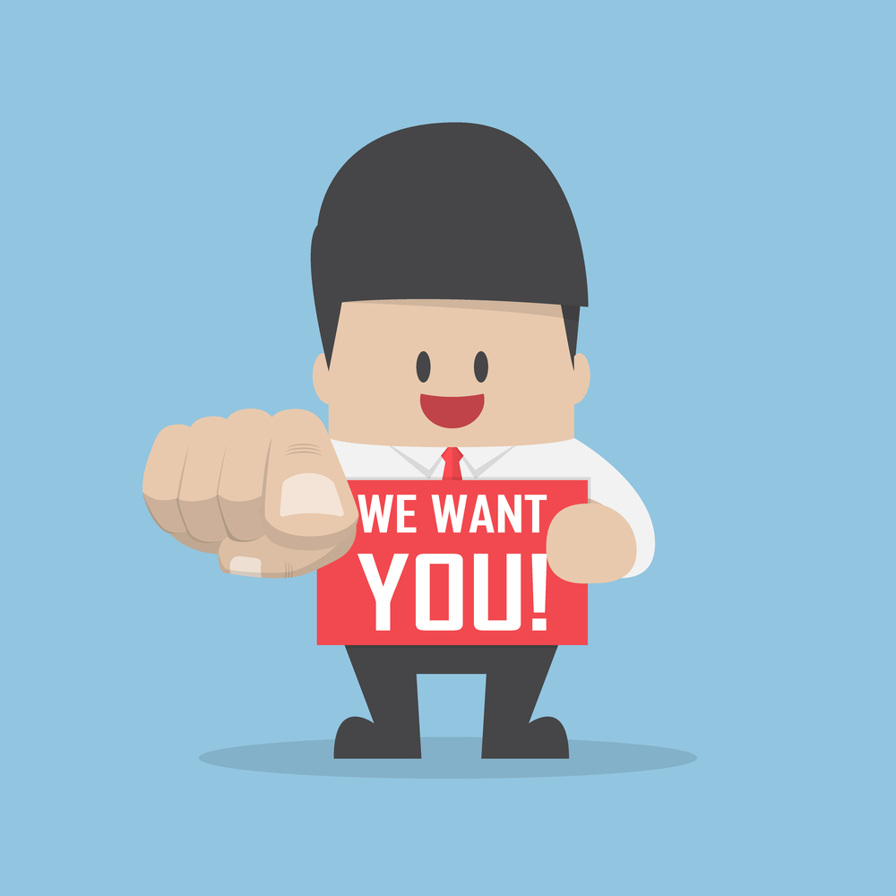 Businessman pointing finger towards you with word we want you, we're hiring and recruitment concept