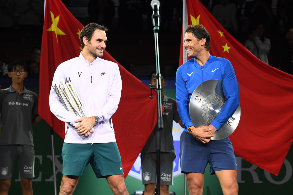 Winner Roger Federer of Switzerland, left, interacts with first runner-up Rafael Nadal of Spain with their trophies after their final of men's singles during the Shanghai Rolex Masters tennis tournament at Qizhong Forest Sports City Tennis Center in Shanghai, China, 15 October 2017.

Roger Federer defeated Rafael Nadal 2-0 (6-4, 6-3) in the final of the Shanghai Rolex Masters tennis tournament on Sunday (15 October 2017). Tennis legends Rafael Nadal and Roger Federer set up their 38th face-to-face ATP World Tour clash on Saturday, defeating Marin Cilic and Juan Martin Del Potro respectively to advance into the Shanghai Rolex Masters final. Current world no.1 Nadal win 23 of the pair's 37 previous matches, but Swiss superstar Federer took the most recent four, including a thrilling five-set victory in the Australian Open final in January. The second-seeded Federer faced big challenges in Saturday's semifinals against Argentine 16th-seeded Del Potro, who showed no signs of problems playing after injuring his left wrist in the quarterfinals.